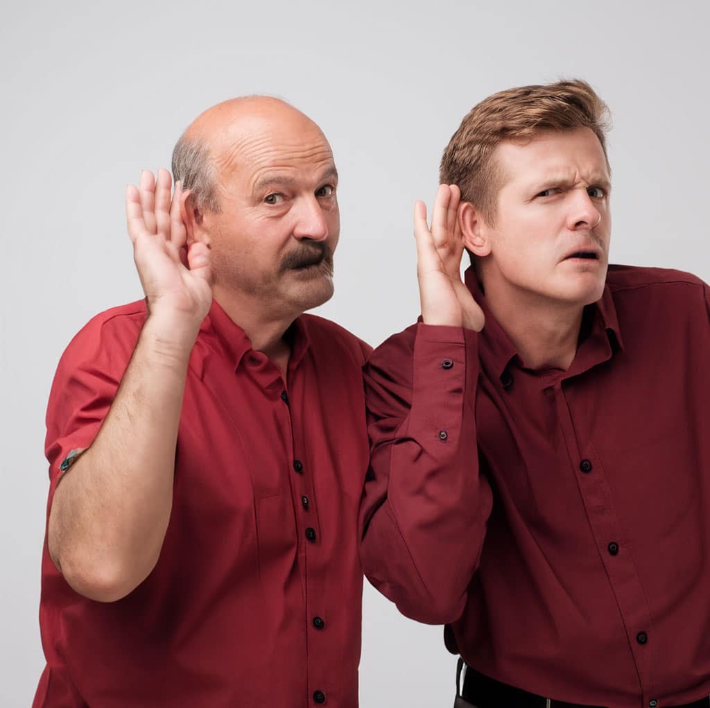 Deux hommes qui écoutent pour un entrepreneur local ou un franchisé | Prex inc.