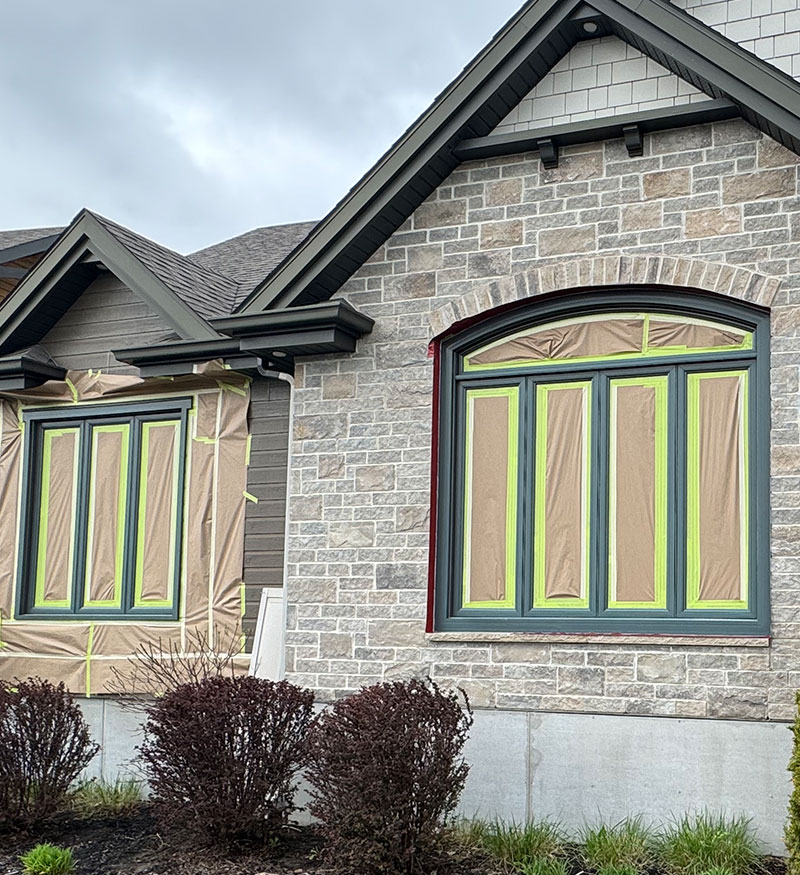 exterior house painting masking in progress | PREX INC.