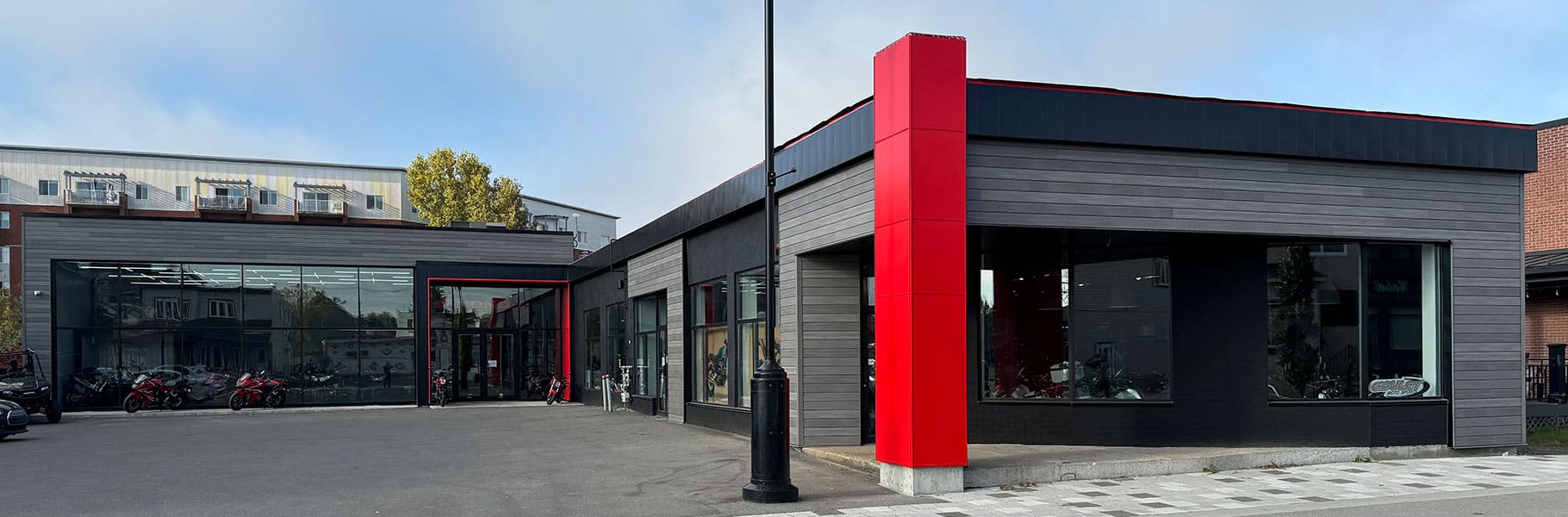 Spray painting of a commercial building | PREX INC.