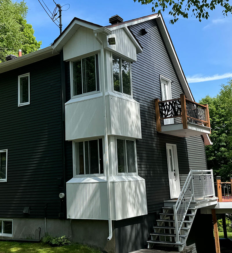 Spray painting of a triplex | PREX INC.